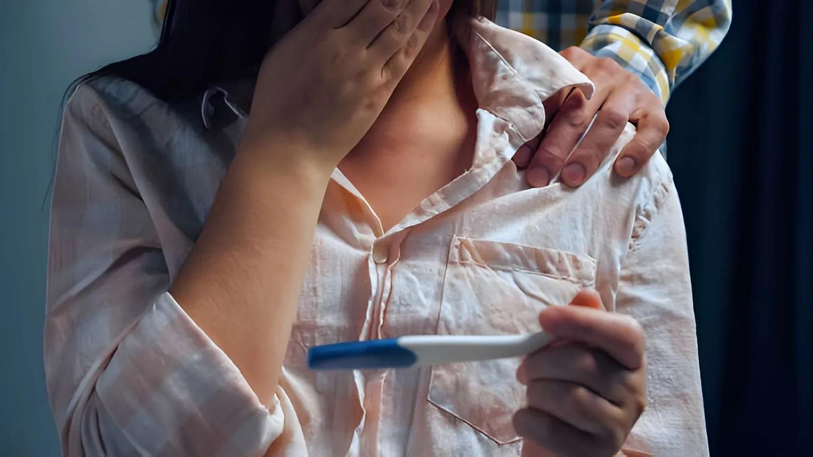 Women checking pregnancy report